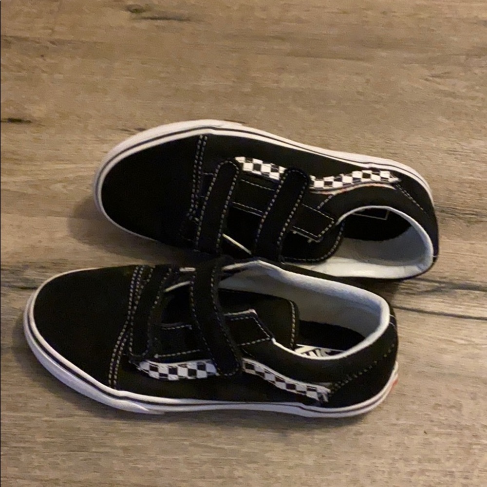 Black vans with removable Velcro detailing